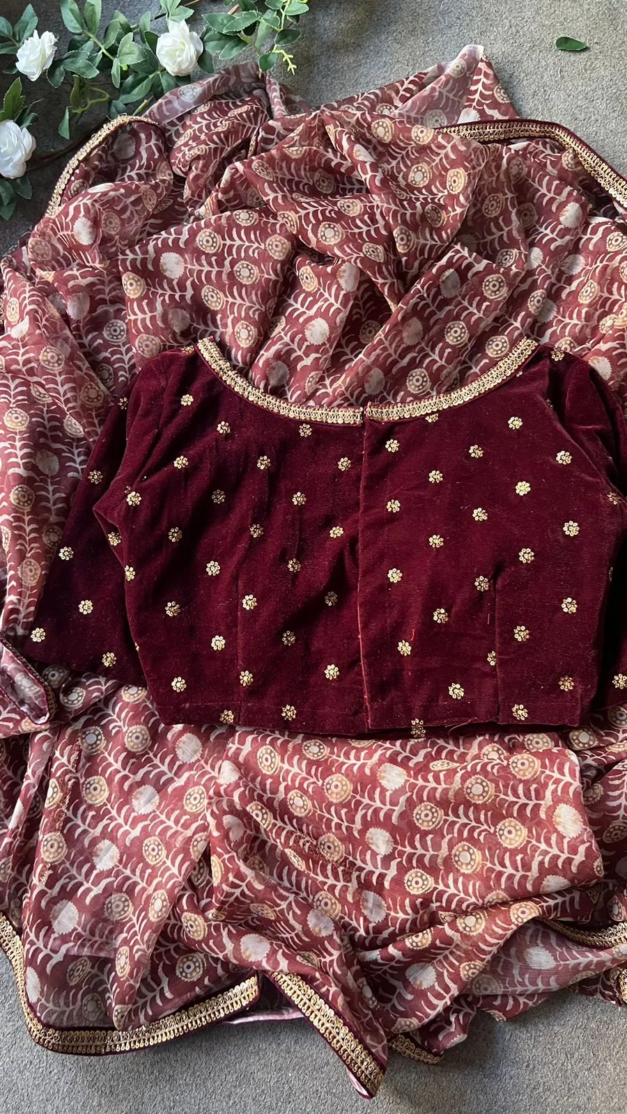 Maroon georgette saree with velvet hand work blouse